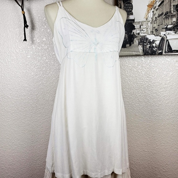 white dress with blue butterflies